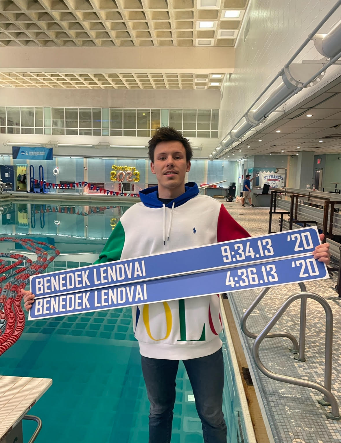 Benedek holds his St. Francis College record boards